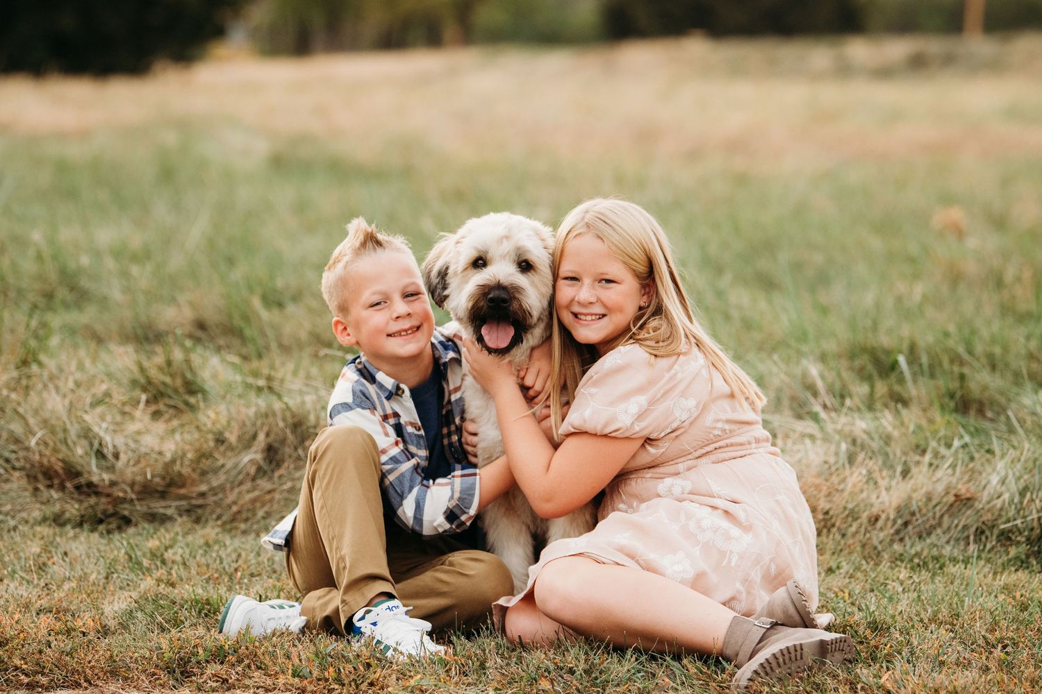 Outdoor lifestyle photography session showing playful moments in a grassy field.