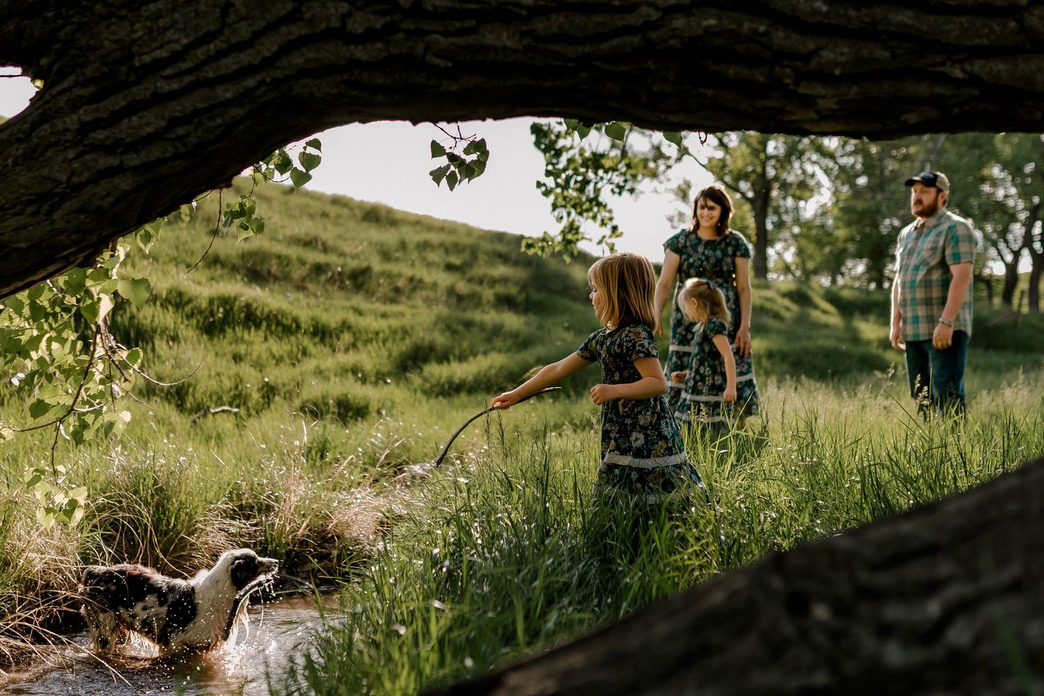Candid family portrait with natural light and movement