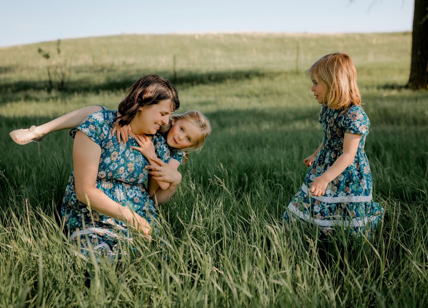 Candid family portrait with natural light and movement