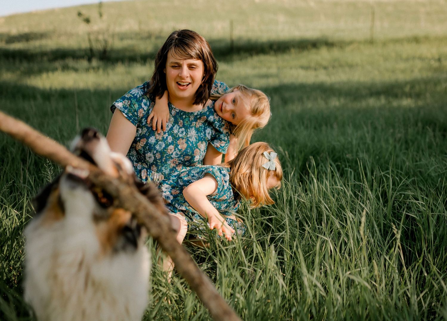 Candid family portrait with natural light and movement