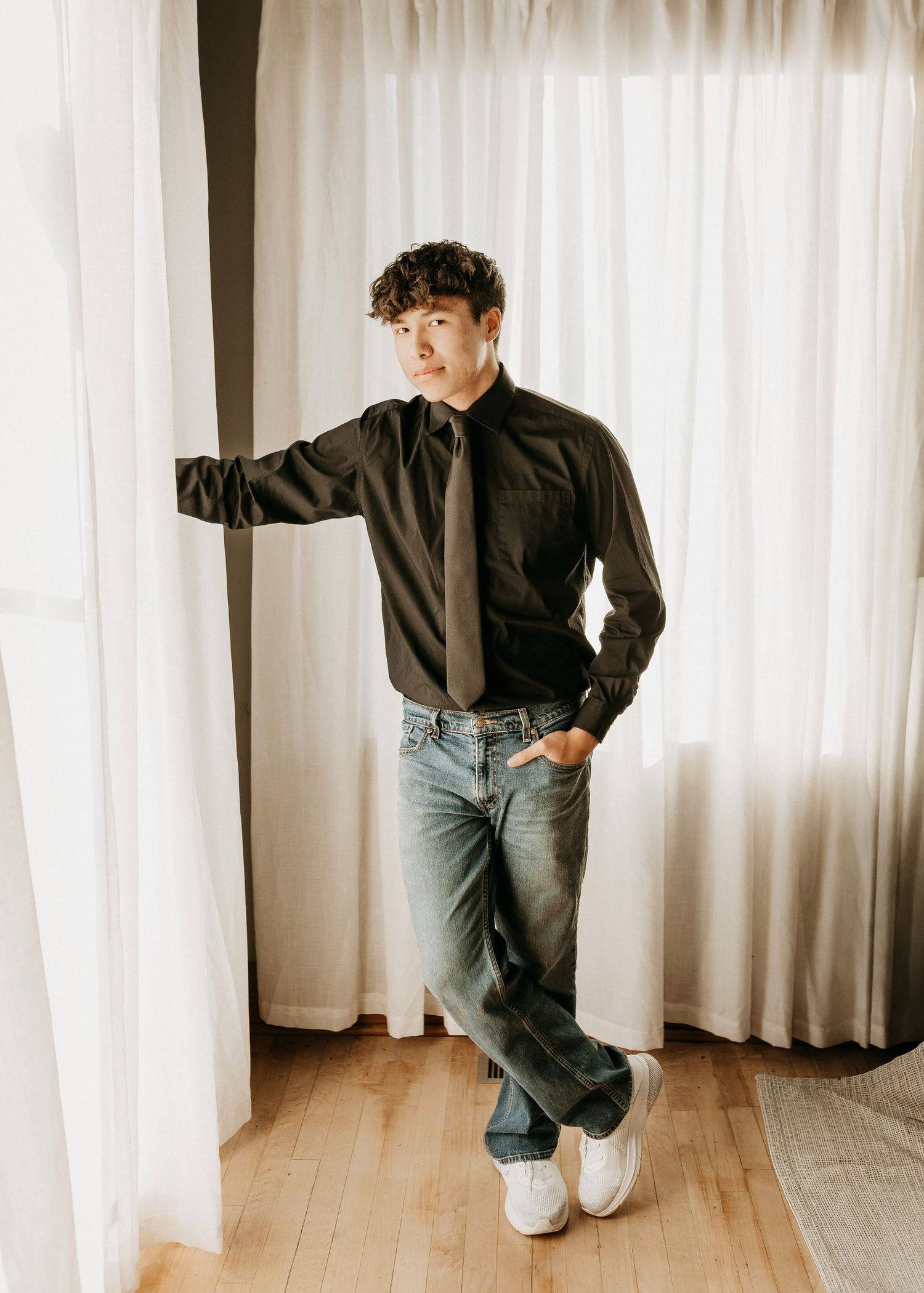 senior boy posing at the photo studio in clark, sd