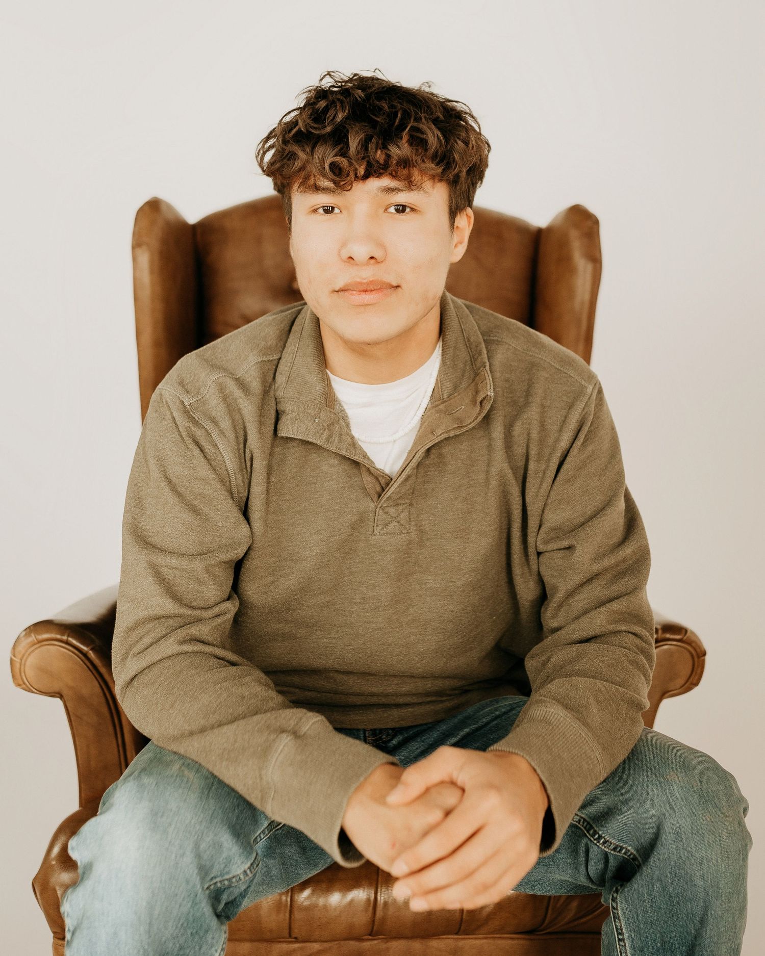 senior boy posing at the photo studio in clark, sd