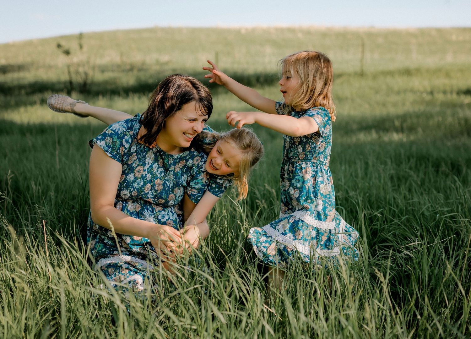 Candid family portrait with natural light and movement