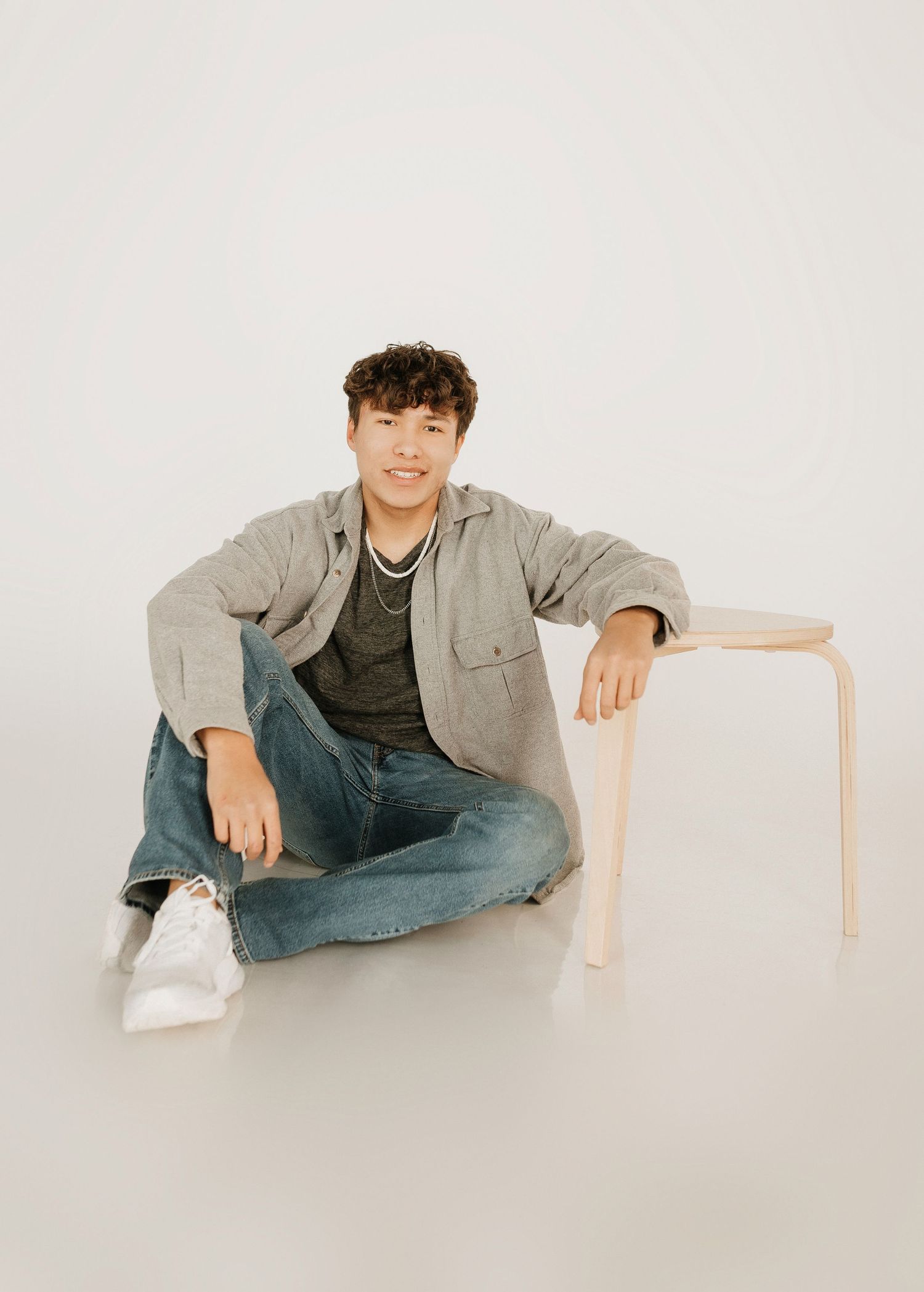 senior boy posing at the photo studio in clark, sd