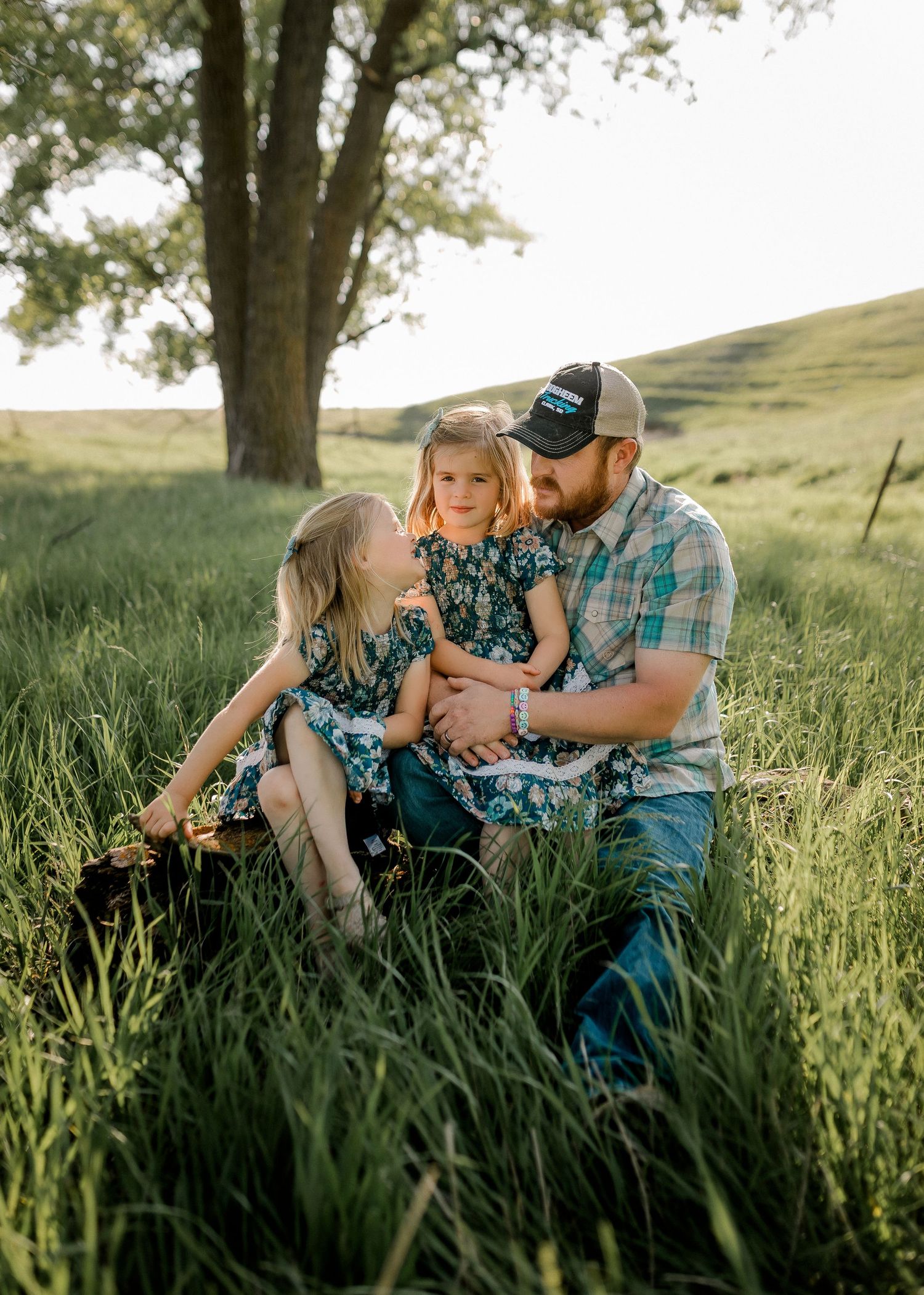 Candid family portrait with natural light and movement