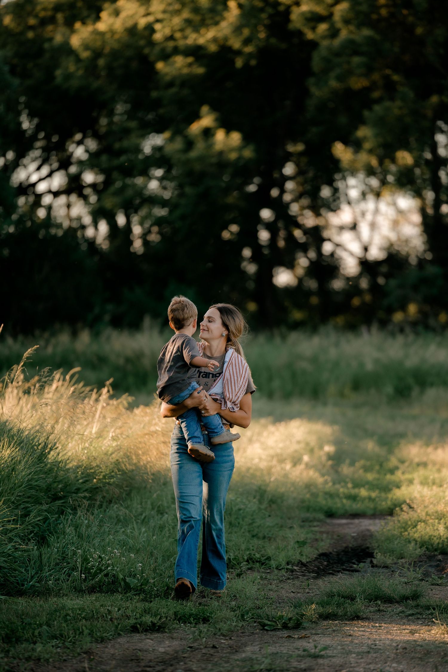 Family portrait on a working farm during lifestyle photo session in Clark County, South Dakota