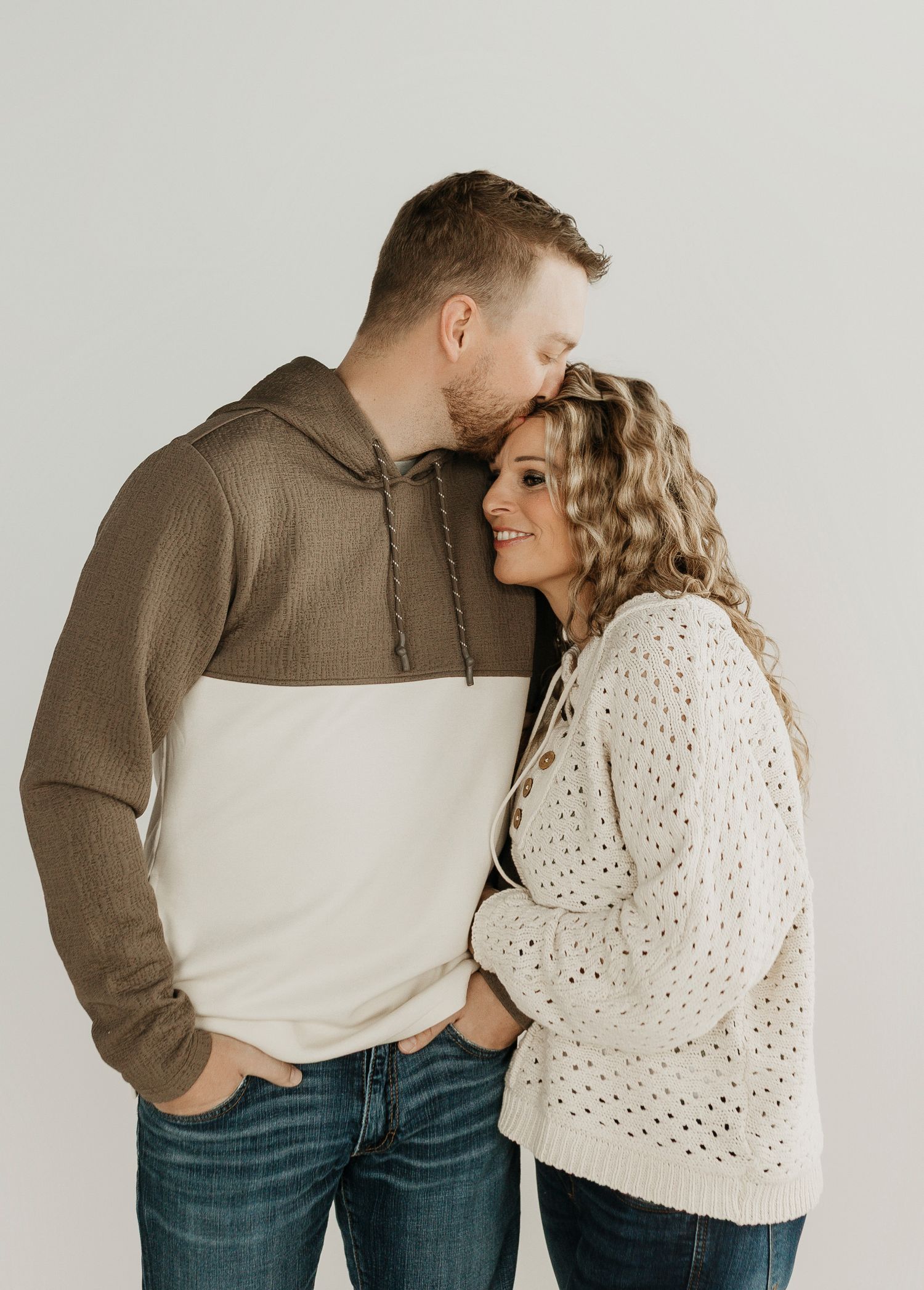 couple photo in neutrals on a white backdrop in clark south dakota