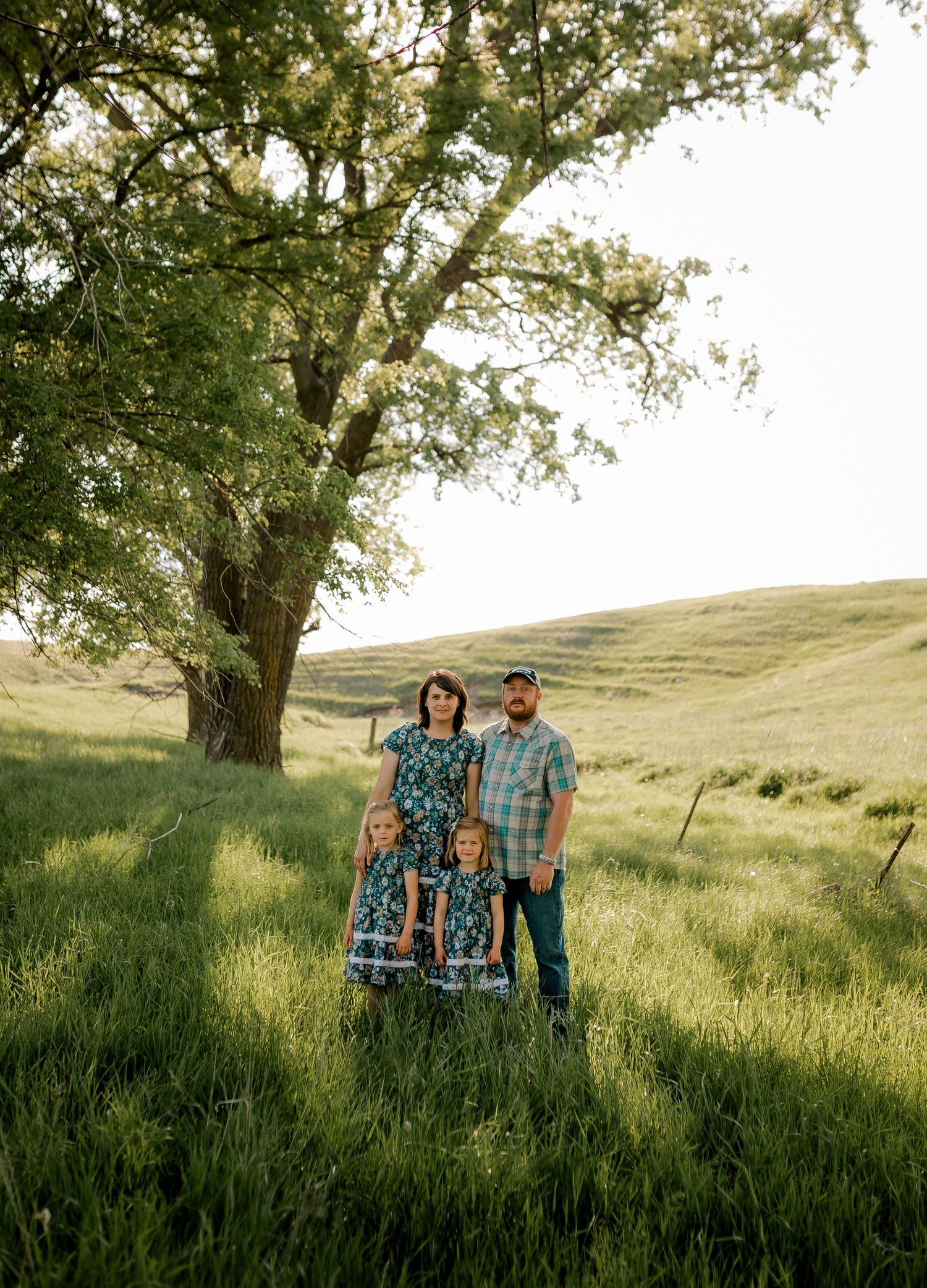 Candid family portrait with natural light and movement