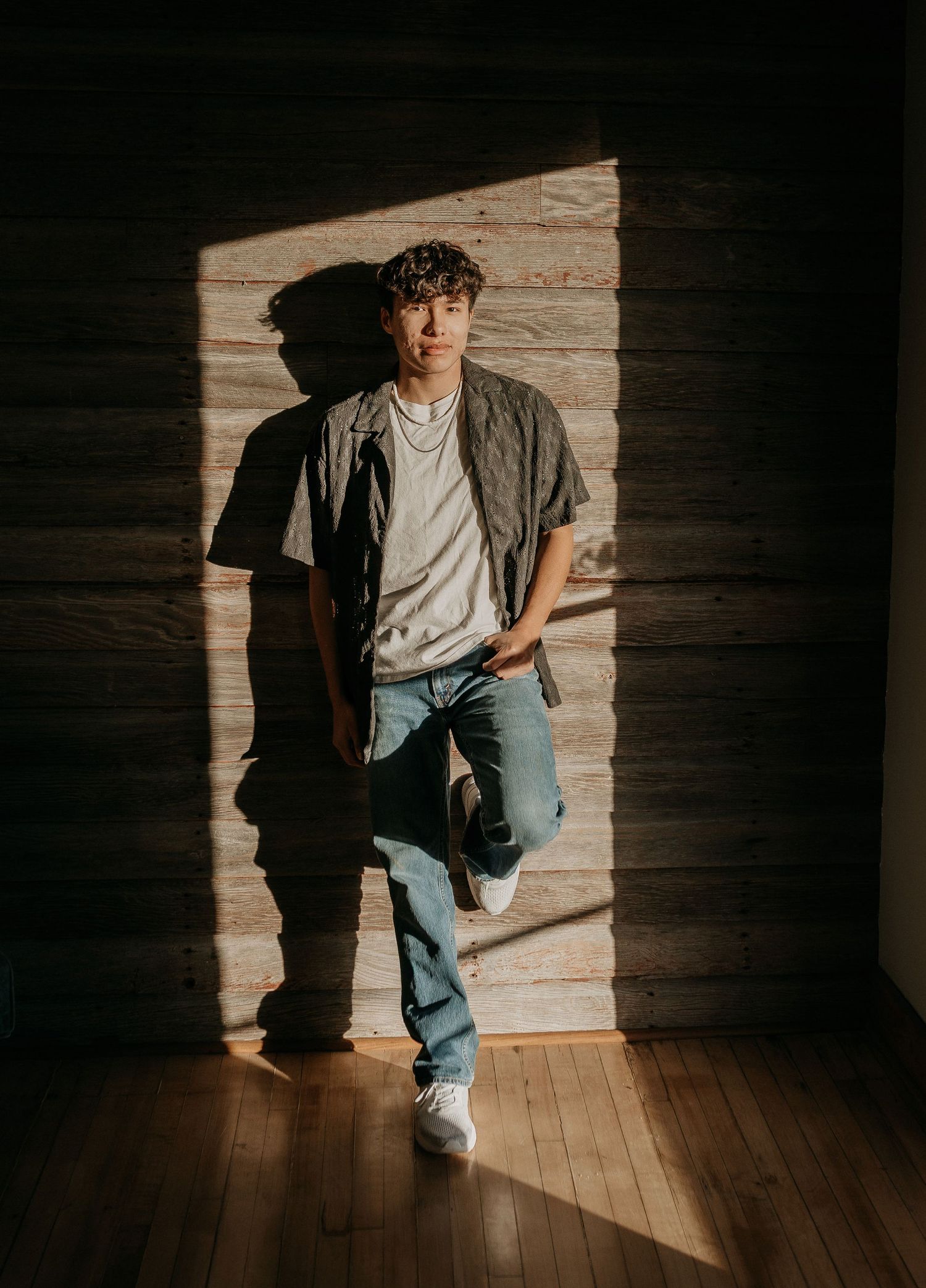senior boy posing at the photo studio in clark, sd