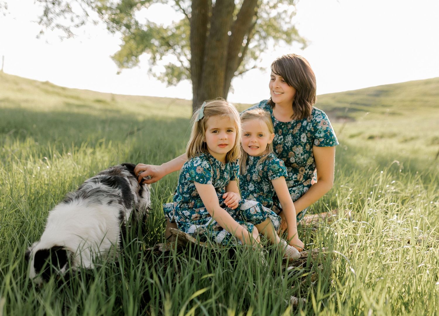 Candid family portrait with natural light and movement