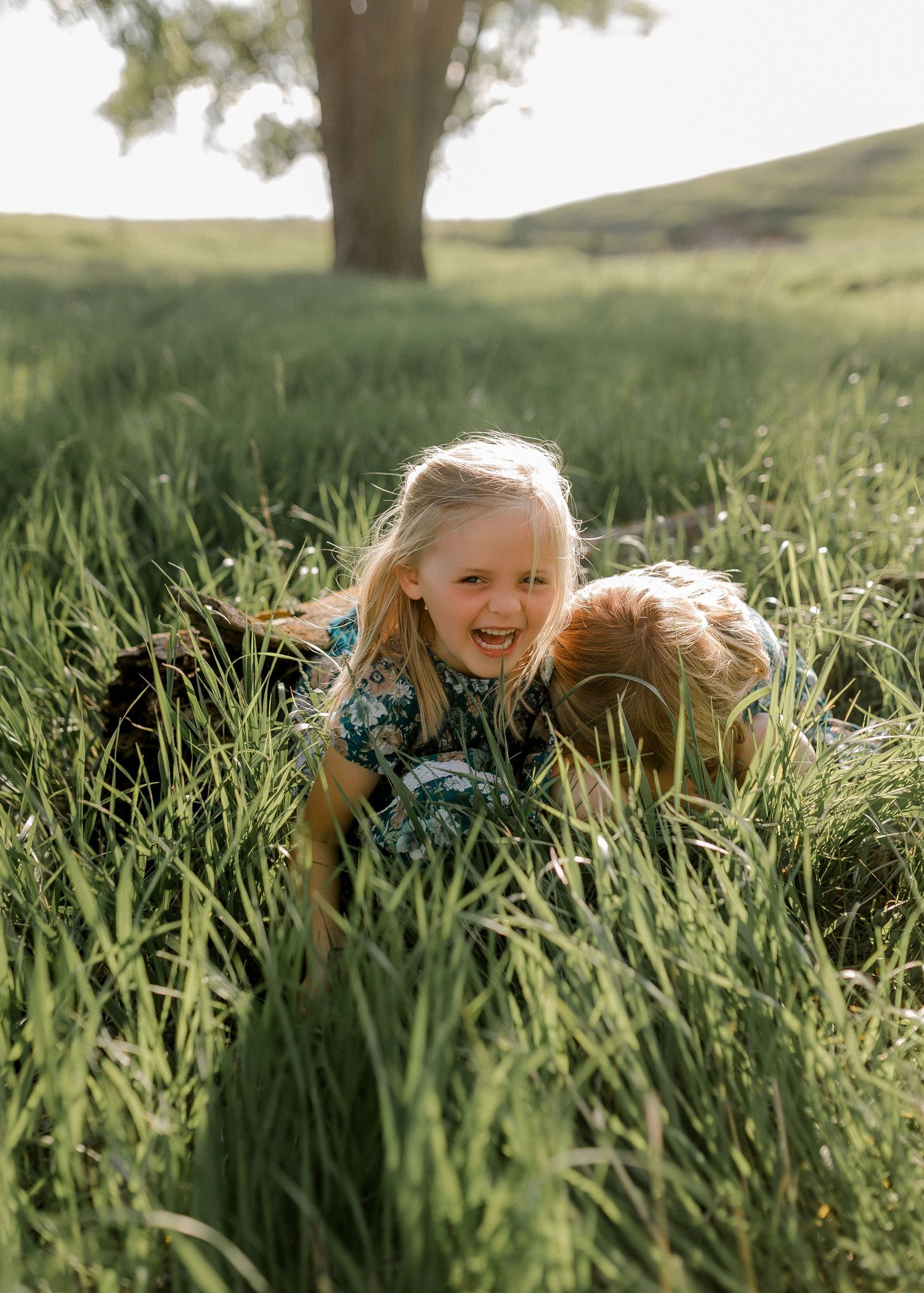 Candid family portrait with natural light and movement