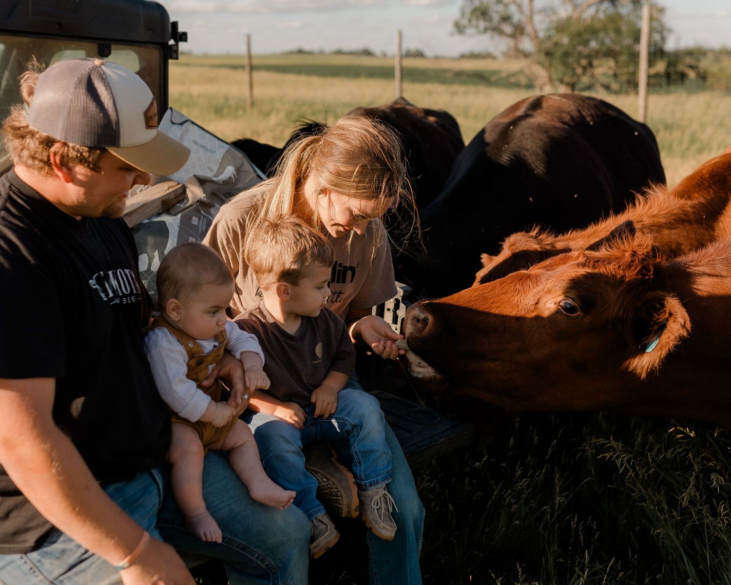 Family portrait on a working farm during lifestyle photo session in Clark County, South Dakota