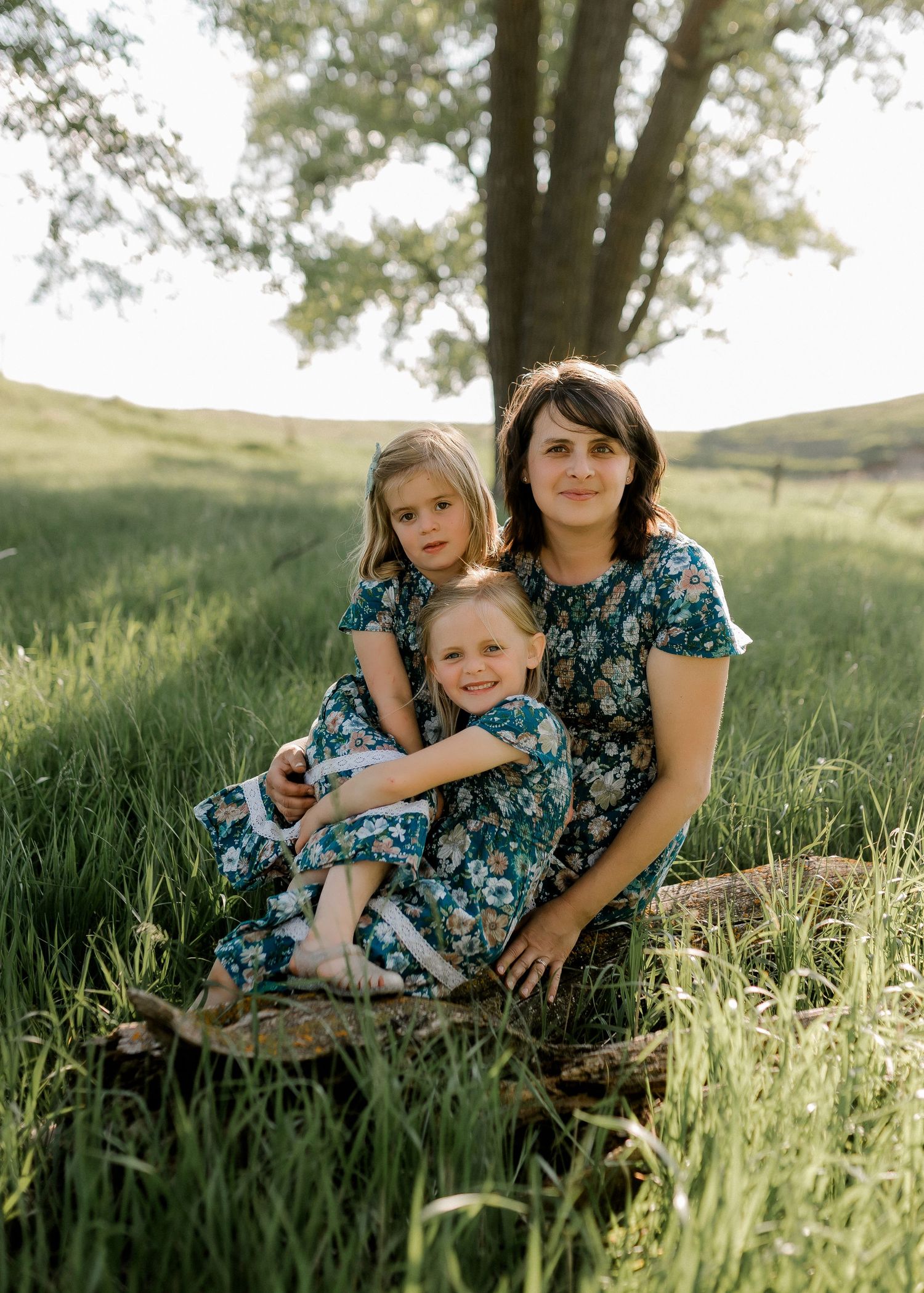 Candid family portrait with natural light and movement