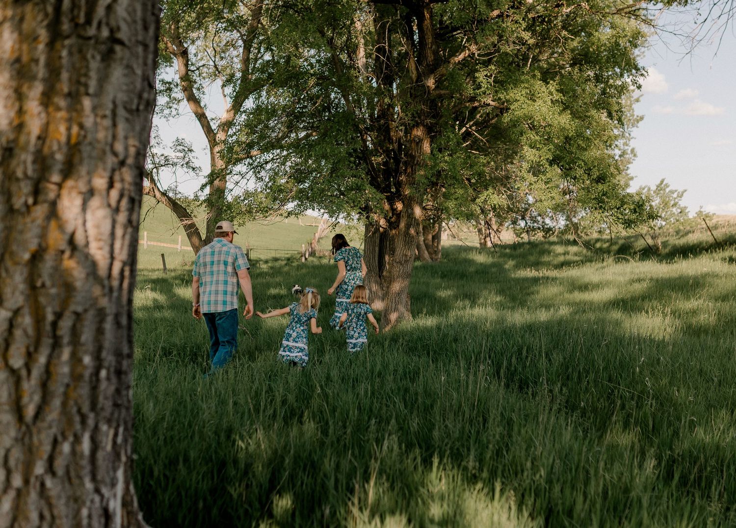 Candid family portrait with natural light and movement
