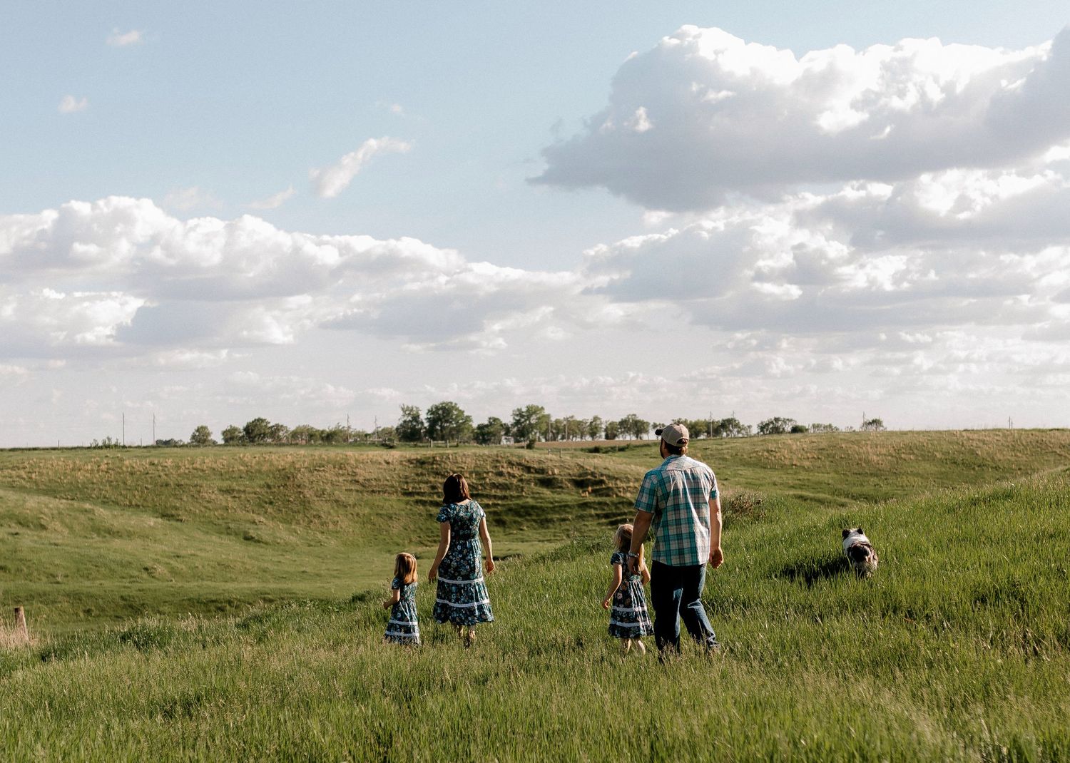 Candid family portrait with natural light and movement