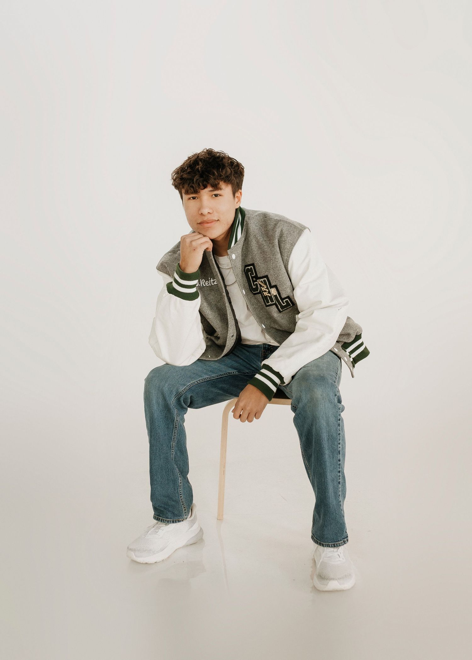 senior boy posing at the photo studio in clark, sd