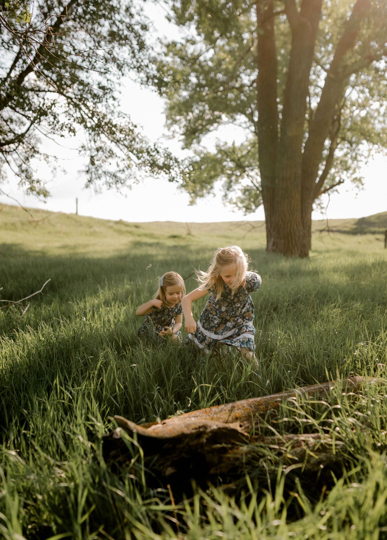 Candid family portrait with natural light and movement