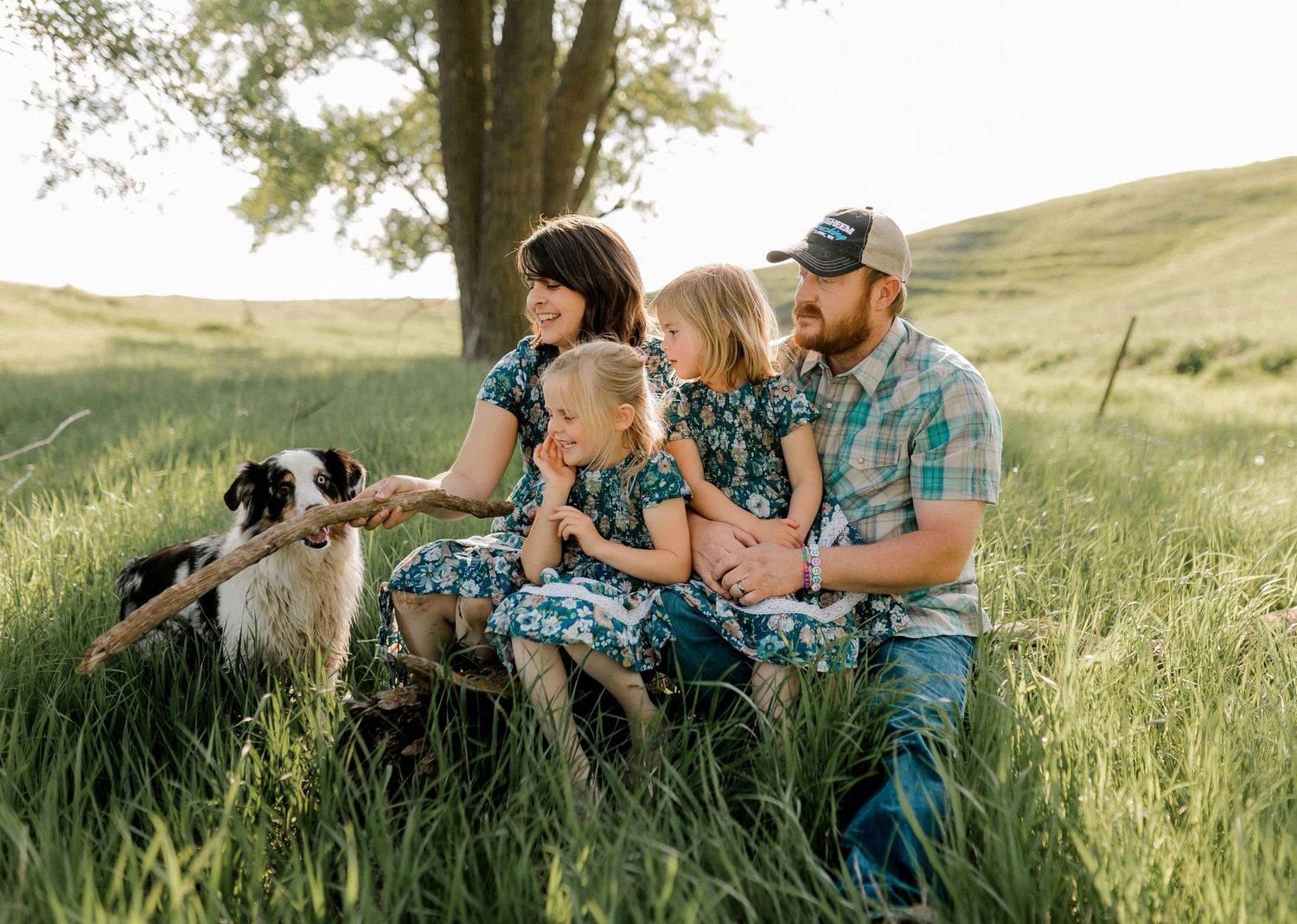 Candid family portrait with natural light and movement