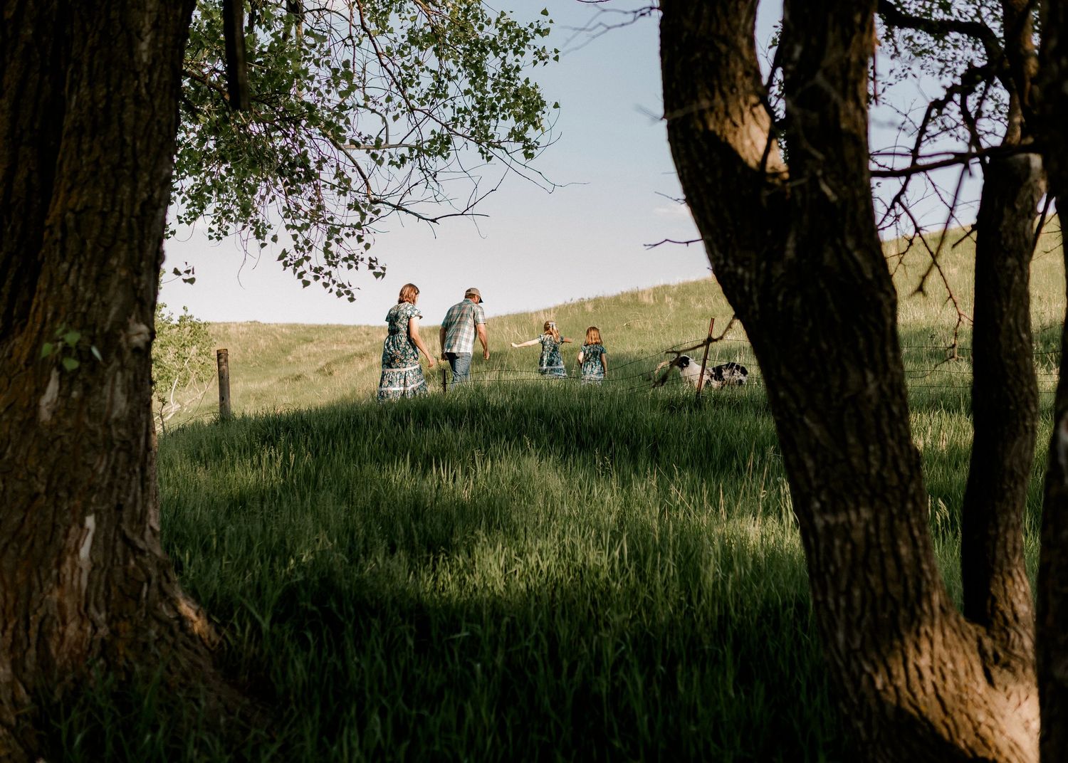 Candid family portrait with natural light and movement