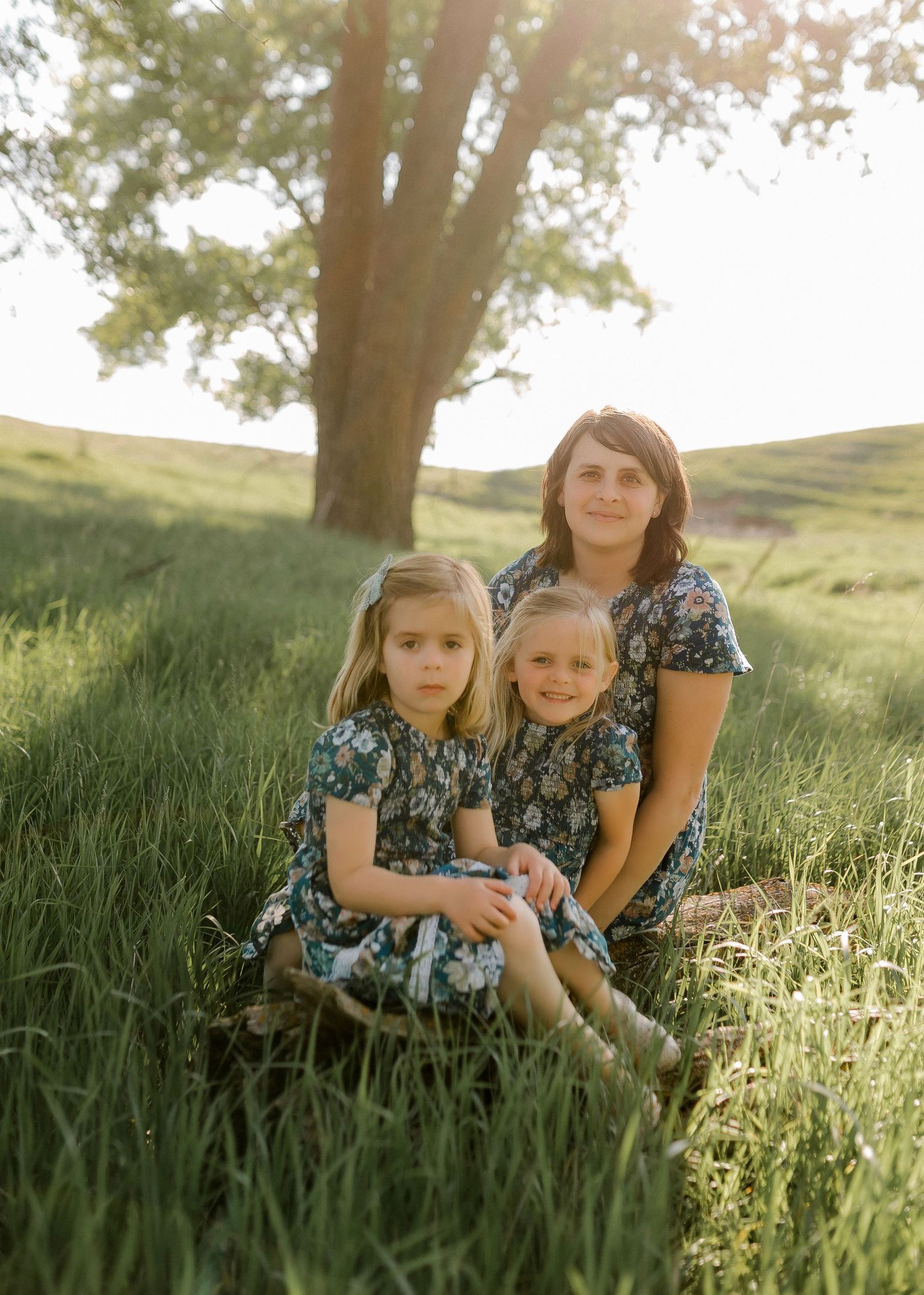Candid family portrait with natural light and movement