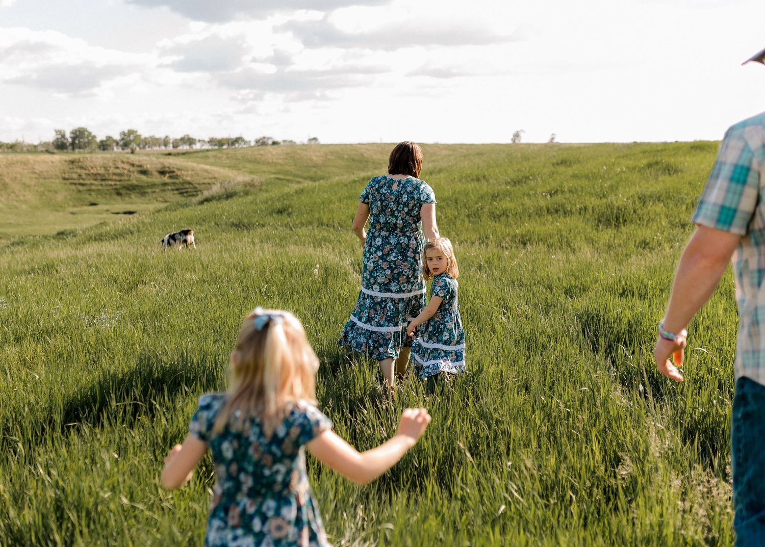 Candid family portrait with natural light and movement