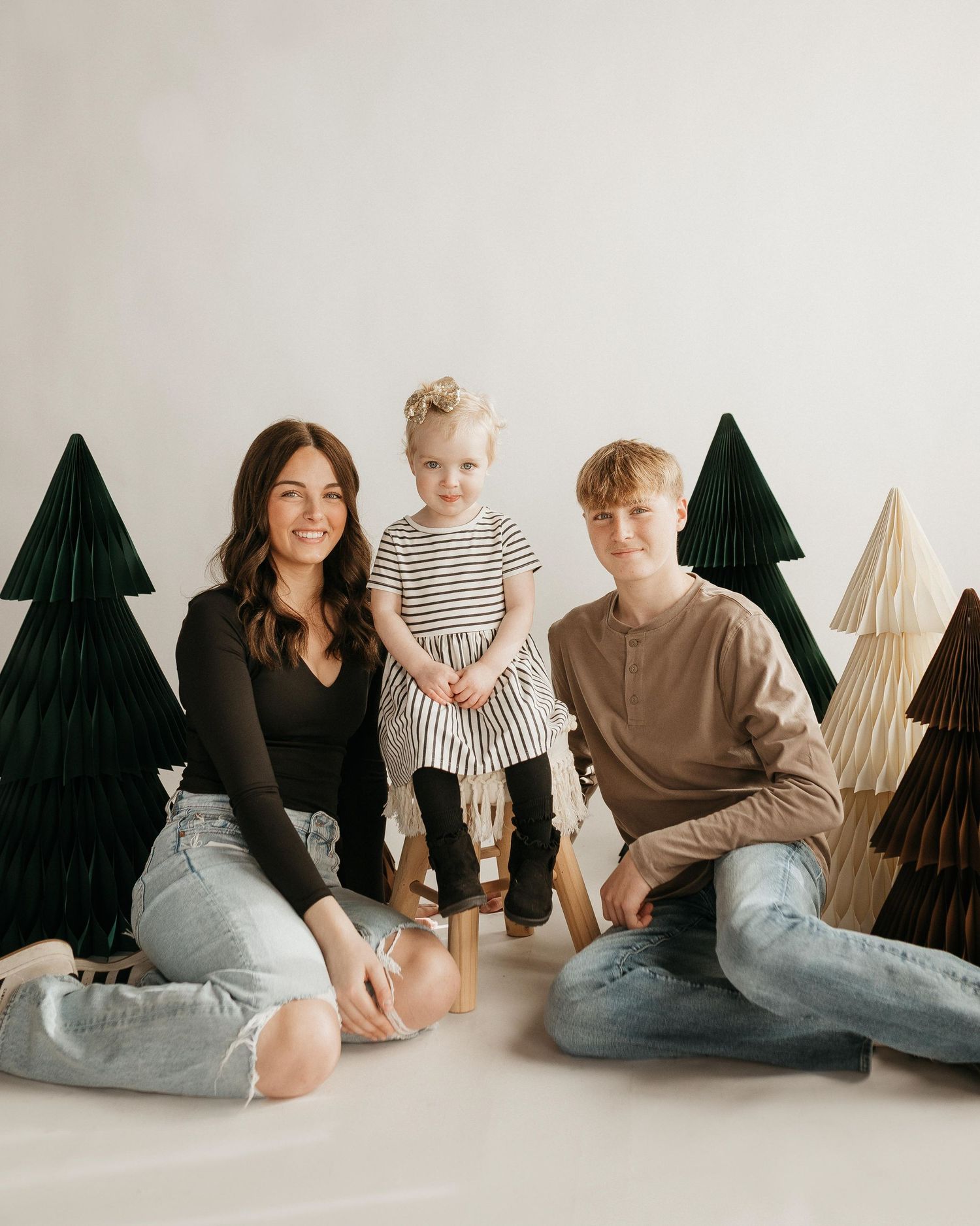 studio portrait at theclark studio of agroup of three kids