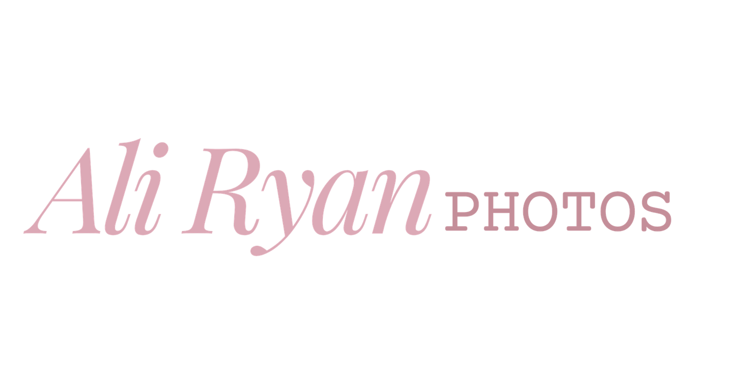 A white and pink logo design for Ali Ryan Photos with elegant script typography.