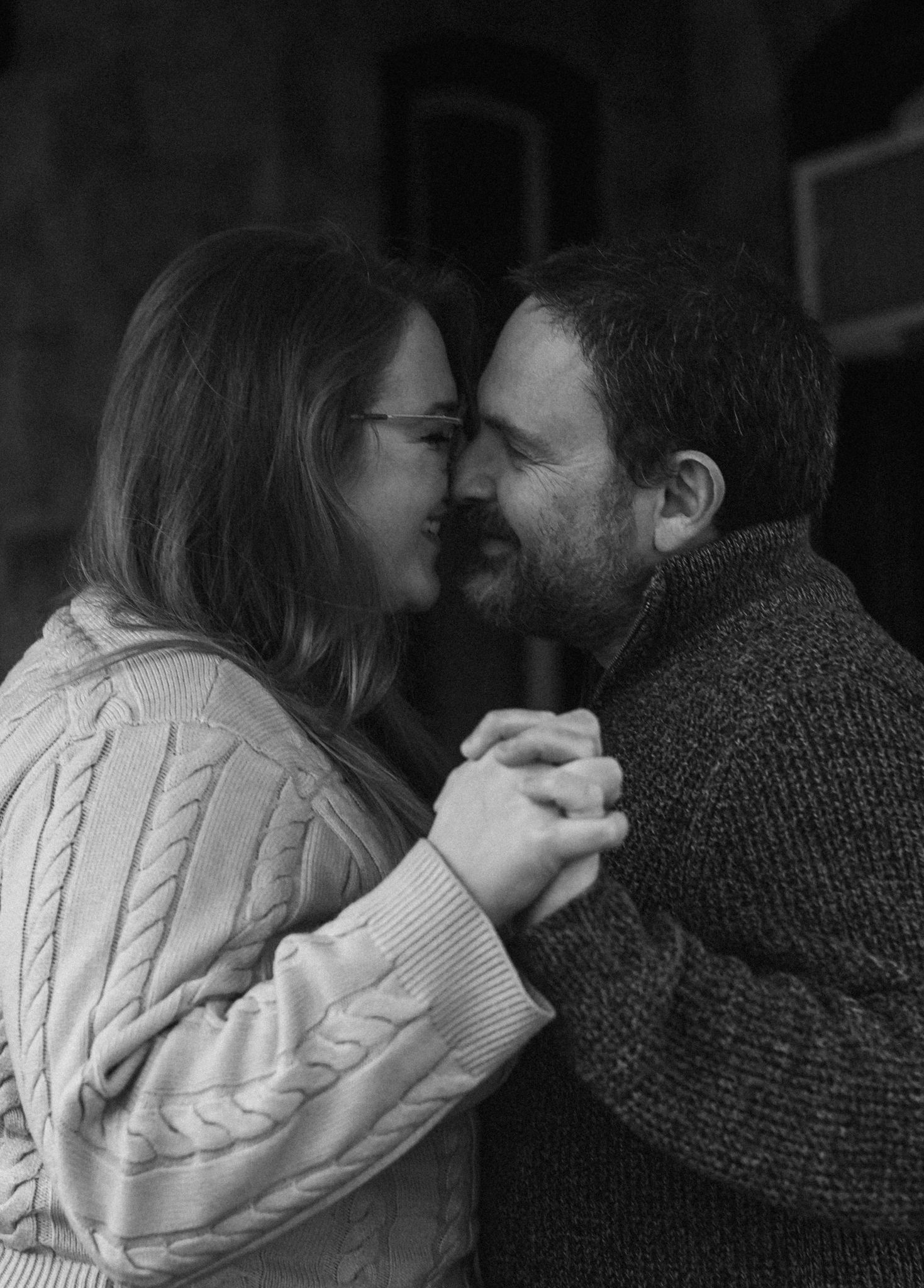 A romantic black and white sequence shows a couple in a white sweater and dark knit top sharing intimate moments.Montgomery County PA