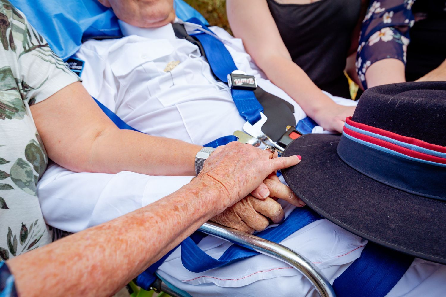 Close up of hands holding, end of life photography