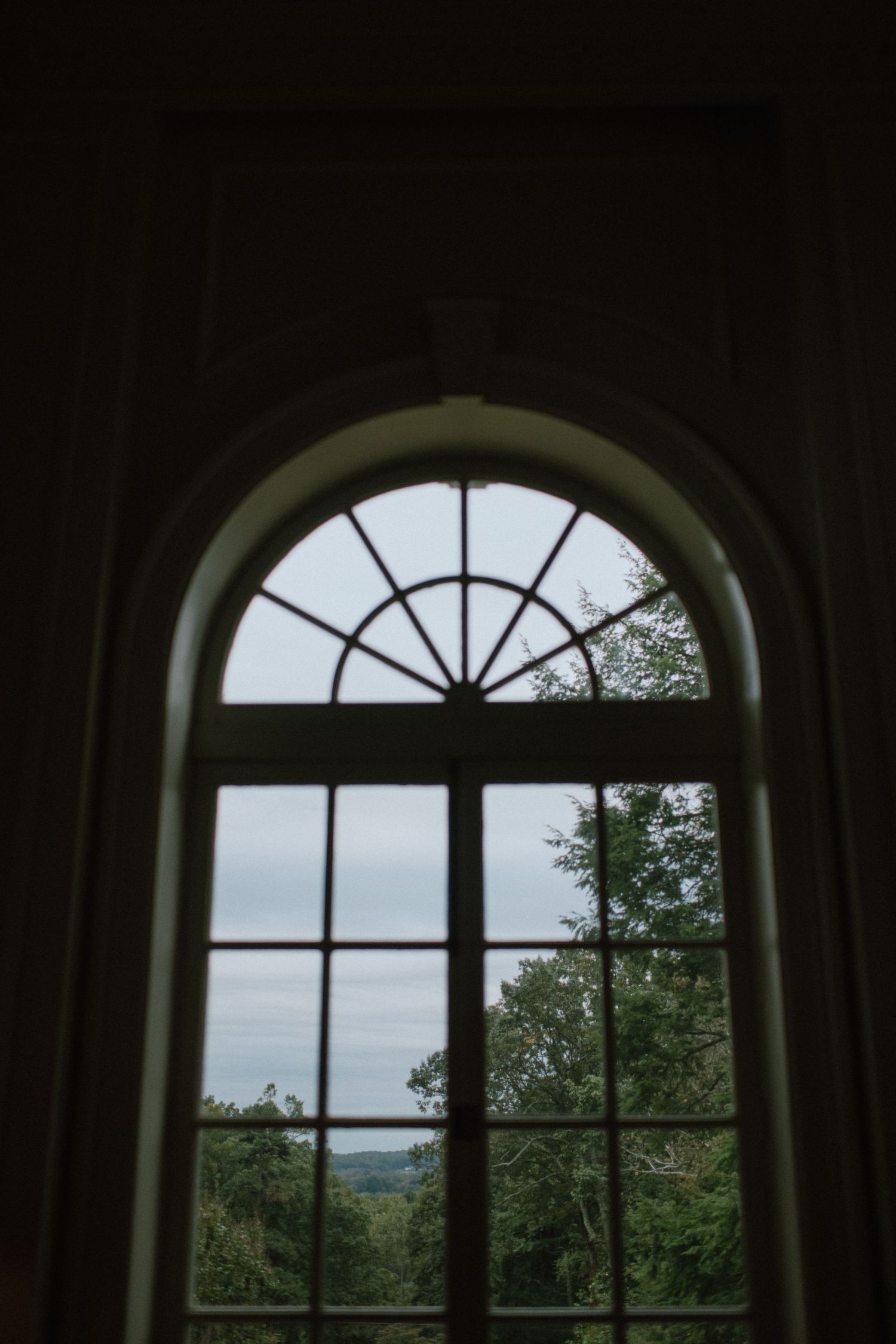 indoor thru the window image to outside of strong mansion in frederick maryland