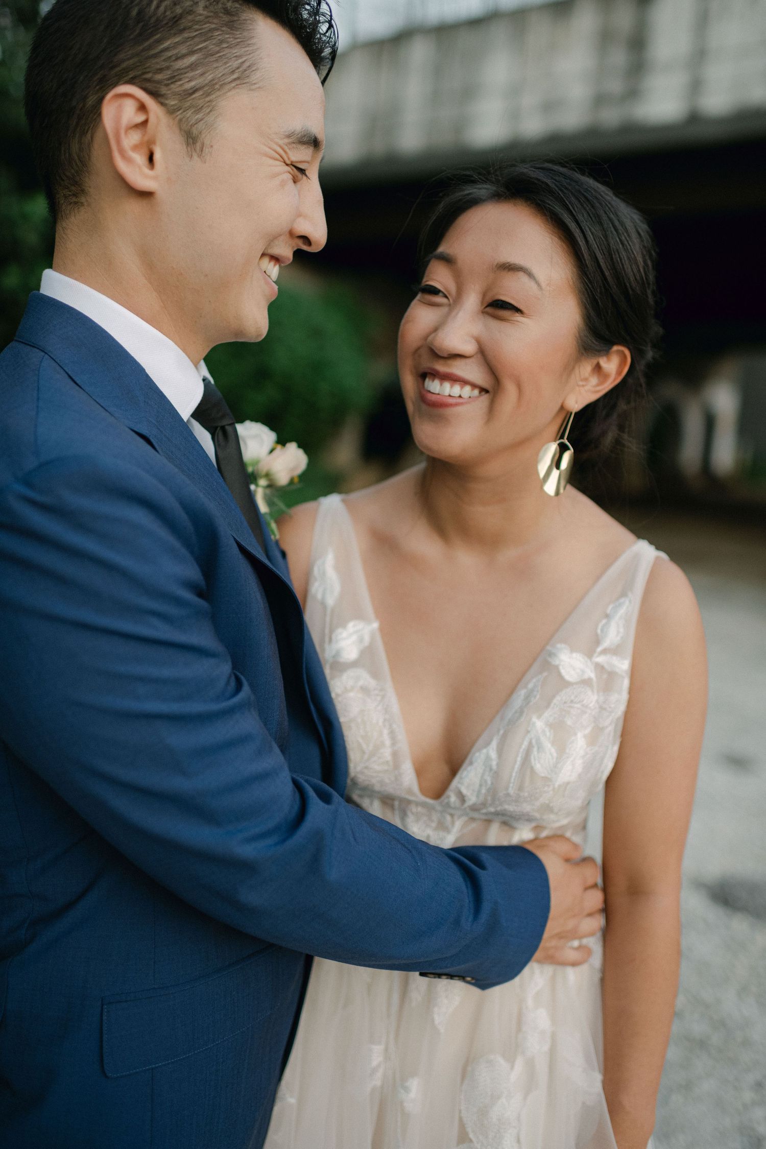 bride laughs at groom