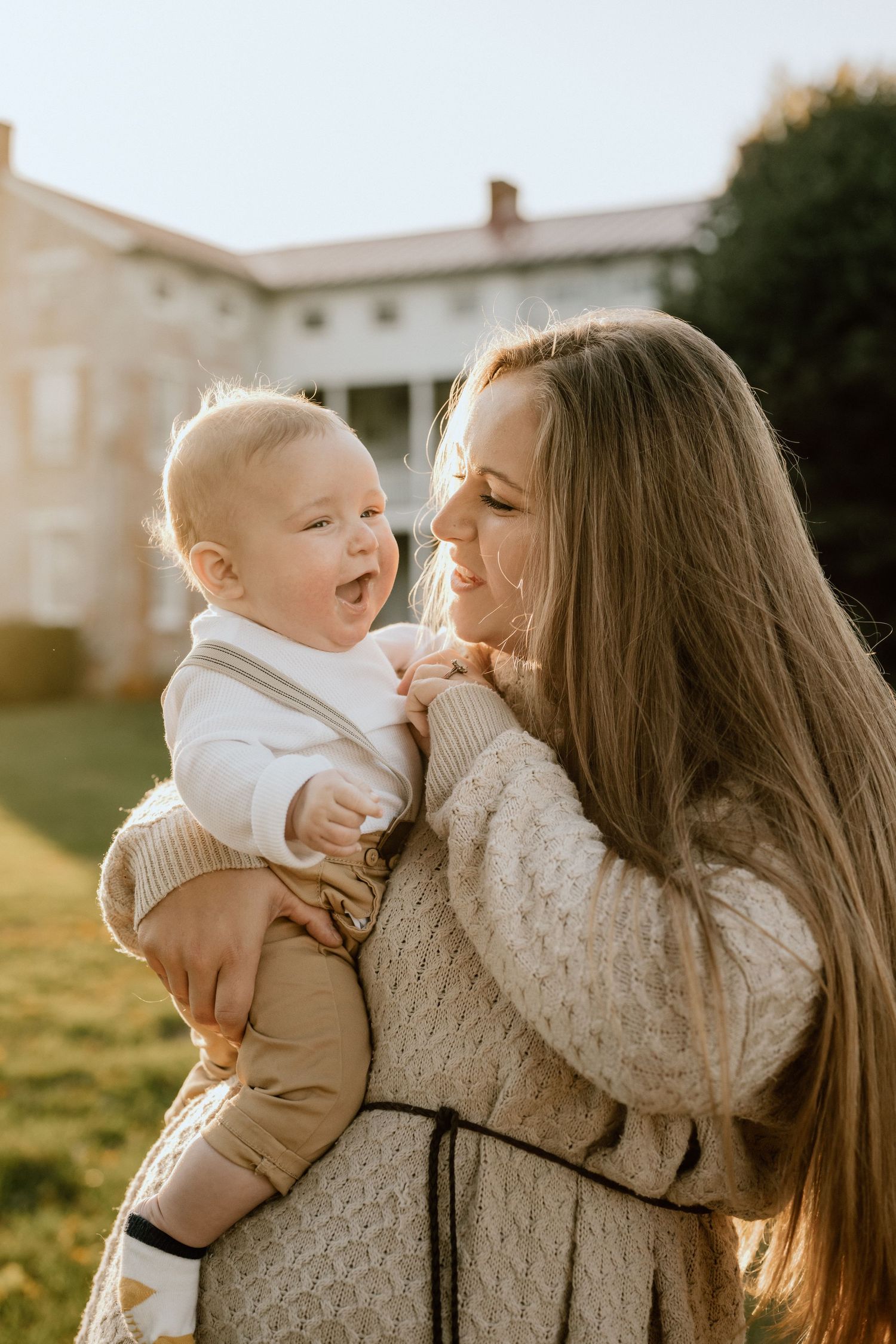 A heartwarming moment shared between two people during golden hour outdoors.