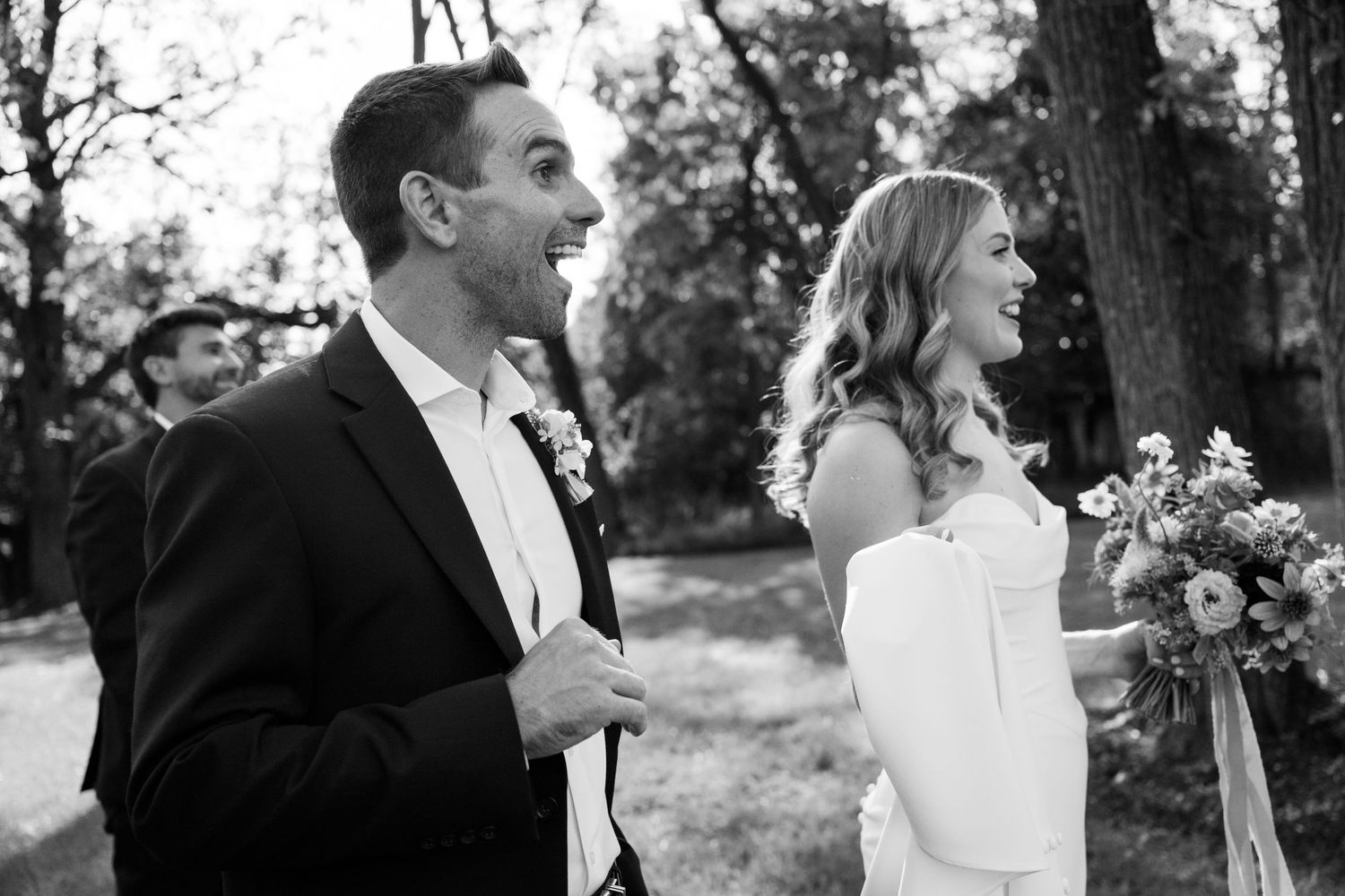 Black and white outdoor wedding portraits captured in natural light.