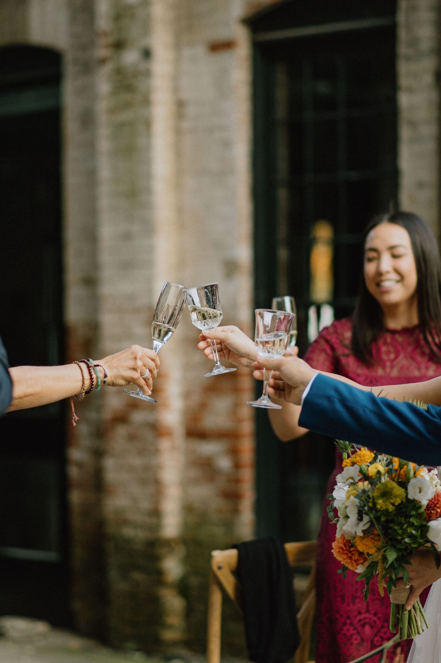 family cheers champagne glasses