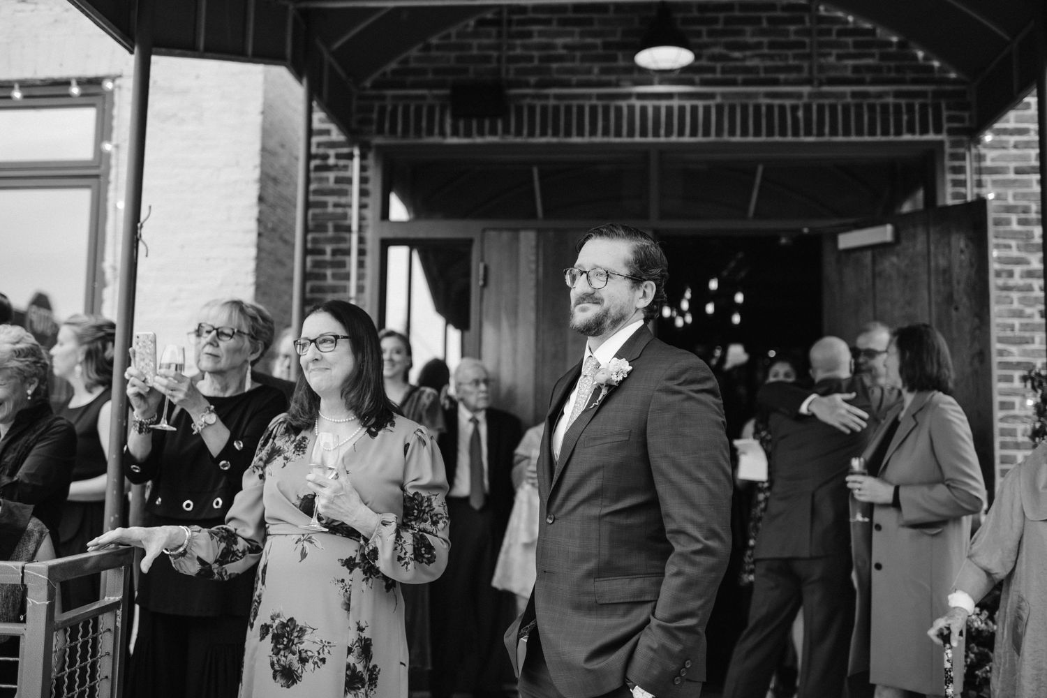 Groom waiting for bride outside Hersh's Baltimore