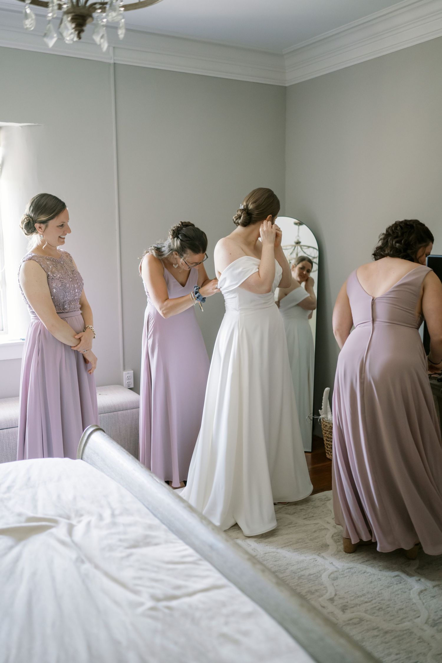 bride and bridesmaids getting ready
