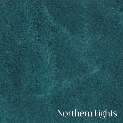 Textured turquoise leather material with subtle variations in color and a natural grain pattern.