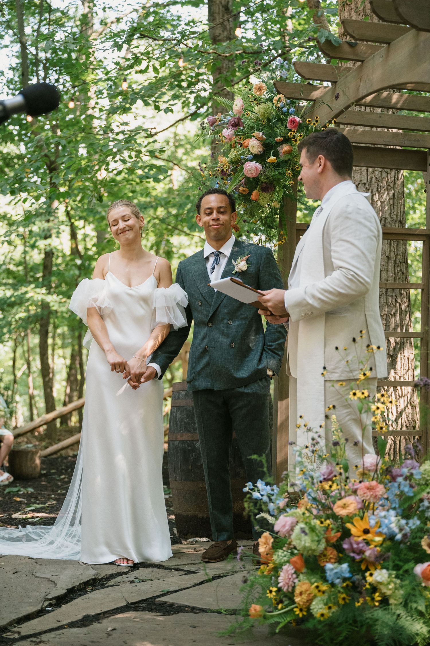 bride and groom at wedding ceremony at camp hidden valley