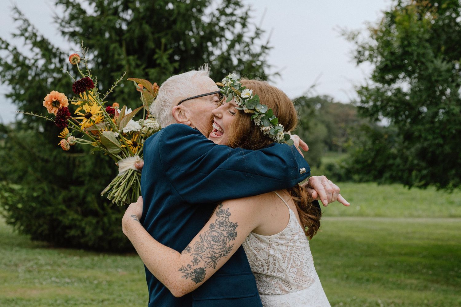 bride hugs grandfather real moment documentary candid wedding photographer photojournalism
