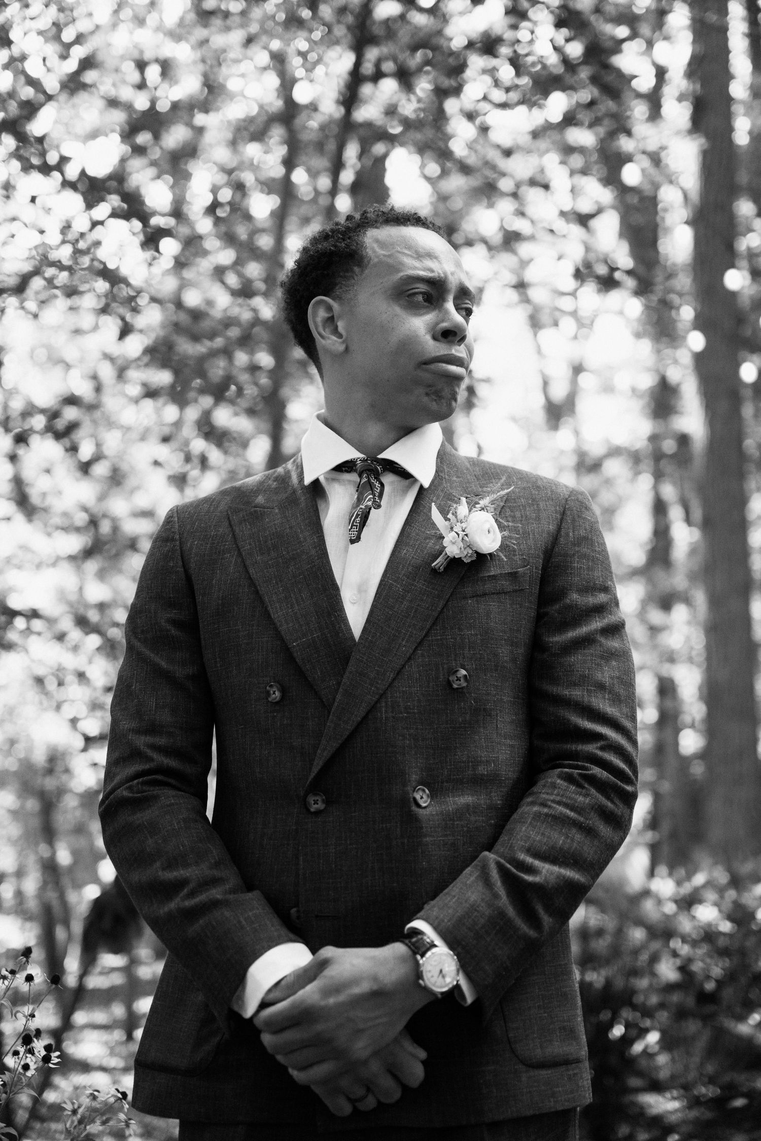 groom tears up when seeing the bride