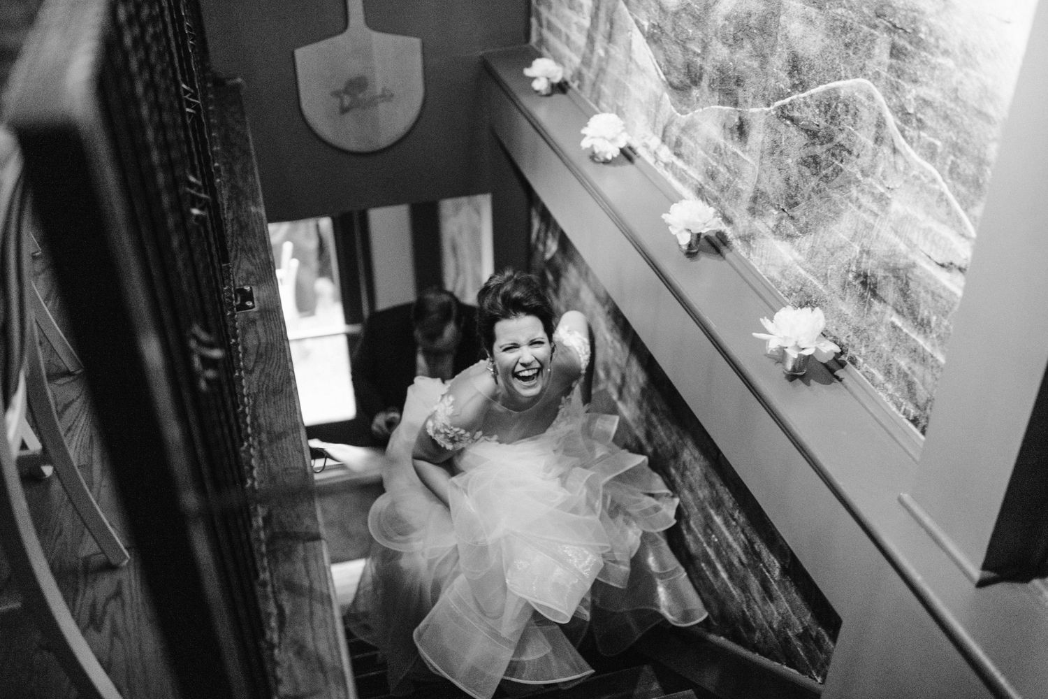 Black and white images showing wedding reception details and decor.