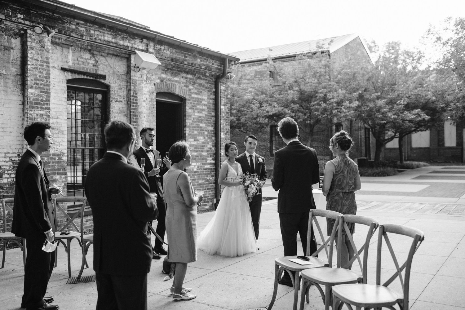 bride and groom listen to dads toast