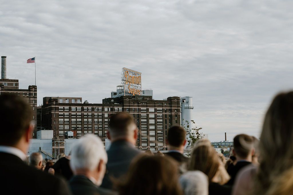 dominoes sugar sign during wedding ceremony at the frederick douglas maritime museum