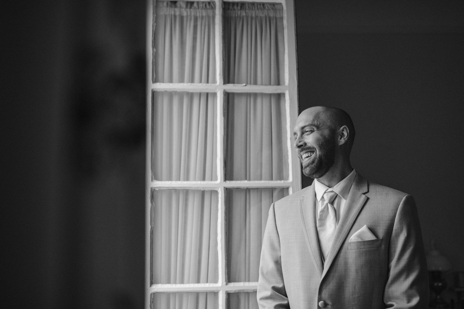 groom in window