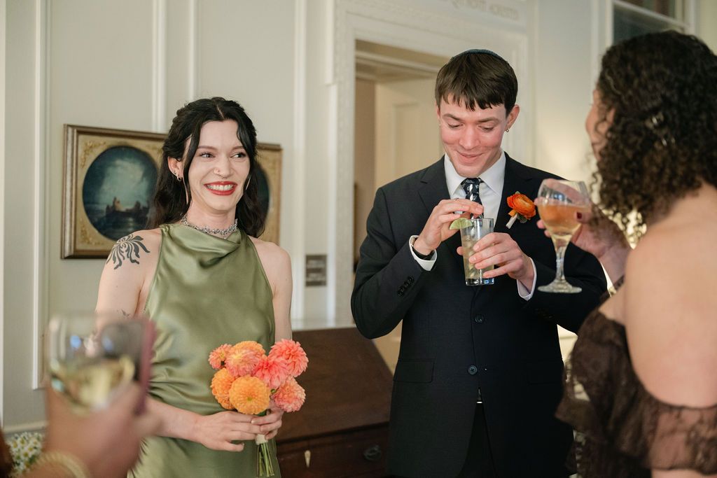 Candid moments captured during an indoor celebration event.