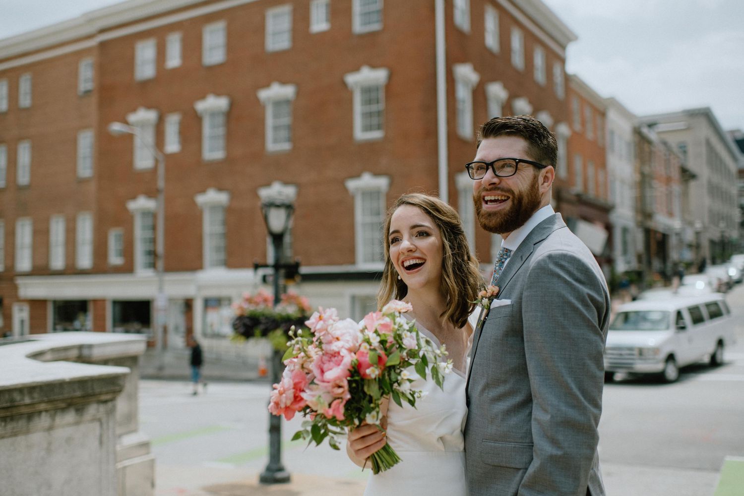 bride and groom laugh