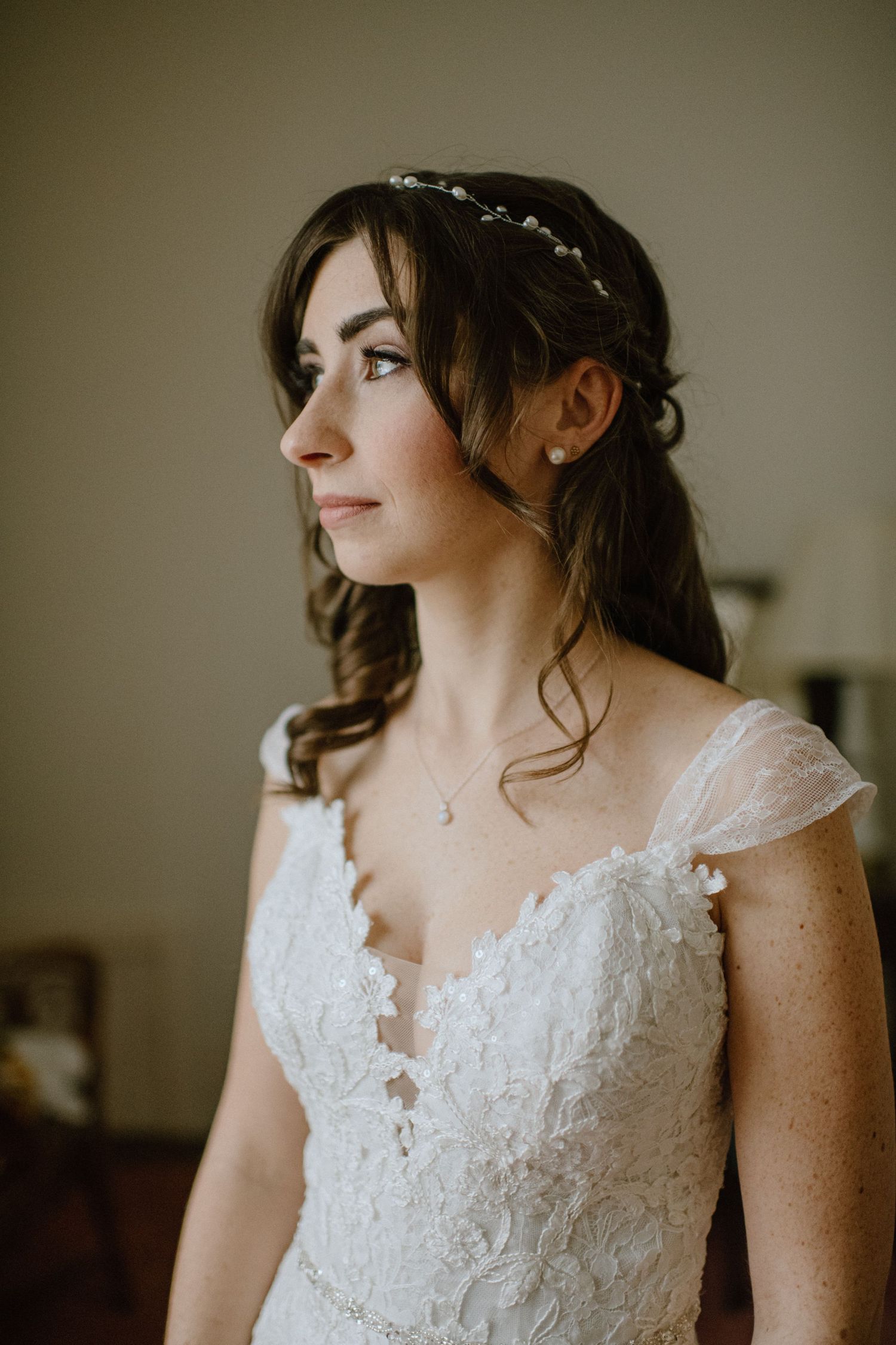 bridal portrait of bride in lace wedding dress