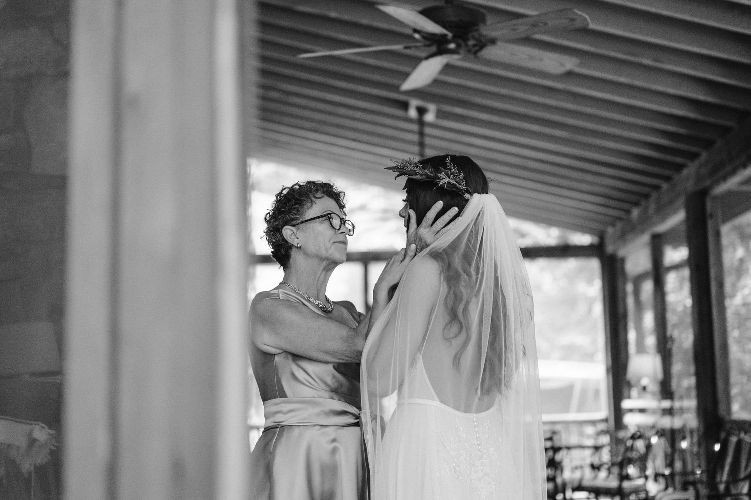 mother hugging bride