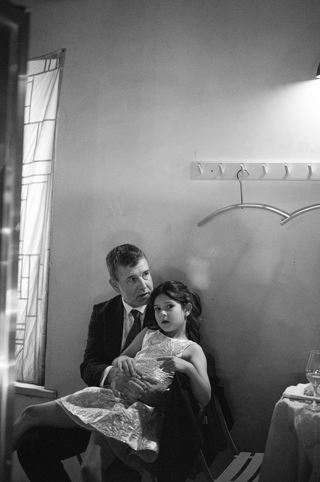 Black and white intimate moment captured during a wedding celebration Fadensonnon in Baltimore