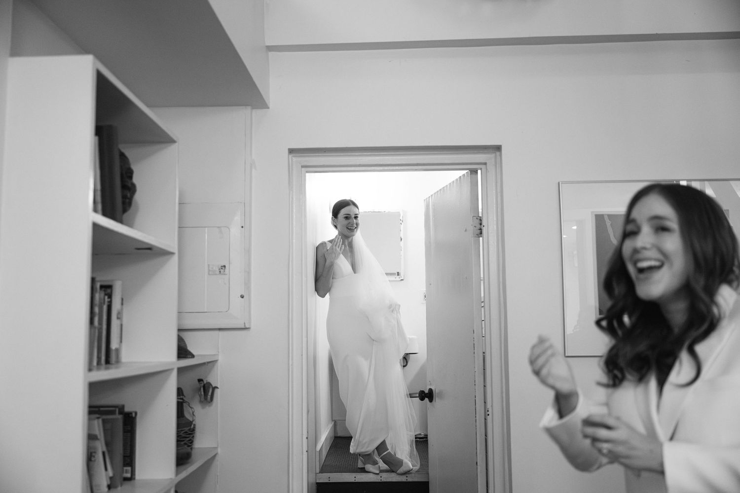 Series of candid black and white shots showing joyful moments in an interior space.